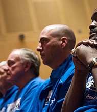 Death row exonerees including Kwame Ajamu, right, listens to speakers during a Witness to Innocence news conference marking the organization's 15th anniversary at the at the National Constitution Center in Philadelphia in 2018.
Mandatory Credit:	Matt Rourke/AP
