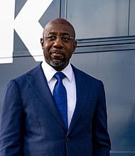 Georgia US Sen. Raphael Warnock slammed the Georgia Legislature for a massive voting bill that would restrict voter access. Warnock is shown meeting with supporters on January 5, 2021, in Marietta, Georgia.
Mandatory Credit:	Megan Varner/Getty Images