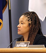 In this Nov. 25, 2019, file photo, Alderman Robin Rue Simmons, 5th Ward, proposes a reparations fund during a City Council meeting in Evanston, lll. Using tax money from the sale of recreational marijuana, the Chicago suburb of Evanston has become the first U.S. city to make reparations available to its Black residents for past discrimination and the lingering effects of slavery. Ms. Simmons proposed the program that was adopted in 2019.