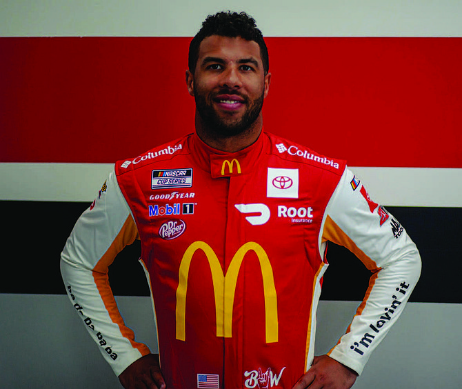 NASCAR driver and advocate Bubba Wallace in his 23XI racing gear