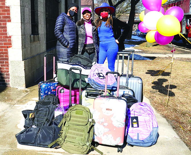 Every Saturday in March from 10 a.m. to 2 p.m., White collects suitcases at an Aaron Bros. storage facility, located at 4030 S. Michigan Ave. Photo provided by Patricia Andrews-Keenan