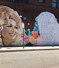 Dolly will be getting a duet partner on the giant-sized wall in West Asheville, North Carolina.
Mandatory Credit:	WLOS