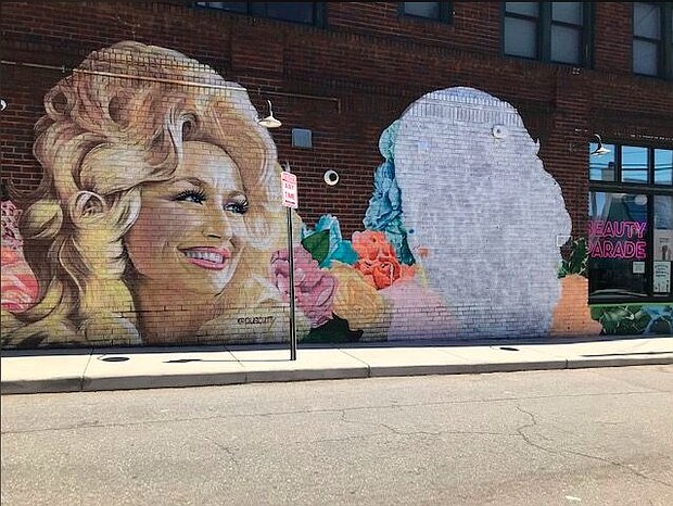 Dolly will be getting a duet partner on the giant-sized wall in West Asheville, North Carolina.
Mandatory Credit:	WLOS