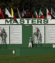 A leading Black civil rights group is calling on the PGA Tour to pull out of the upcoming Masters Tournament in Augusta after Republican Gov. Brian Kemp last week signed into law one of the nation's most restrictive voting rights. Course workers are shown during the final round of the Masters at Augusta National Golf Club on November 15, 2020.
Mandatory Credit: Patrick Smith/Getty Images