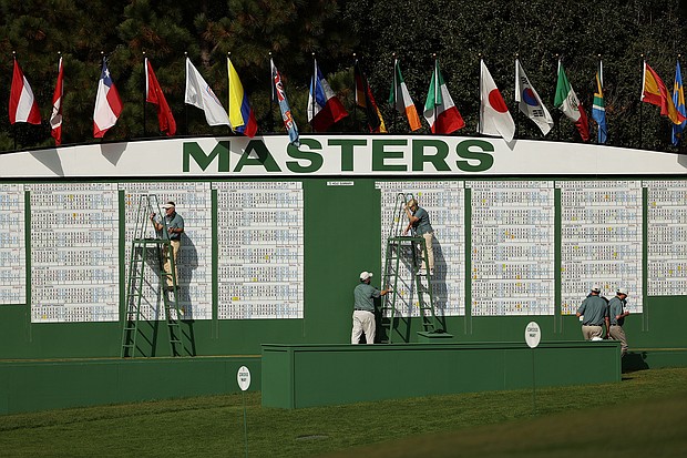 A leading Black civil rights group is calling on the PGA Tour to pull out of the upcoming Masters Tournament in Augusta after Republican Gov. Brian Kemp last week signed into law one of the nation's most restrictive voting rights. Course workers are shown during the final round of the Masters at Augusta National Golf Club on November 15, 2020.
Mandatory Credit:	Patrick Smith/Getty Images