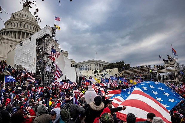 Two US Capitol Police officers who say they were injured during the January 6 insurrection, seen in this photo, are suing former President Donald Trump for inciting the crowd.
Mandatory Credit: Brent Stirton/Getty Images
