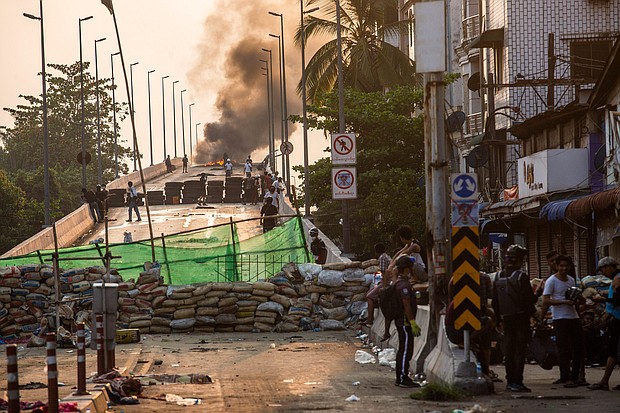 The State Department has ordered the departure of all non-emergency US government personnel and their family members from Myanmar. Anti-coup protesters are shown in Yangon, Myanmar Wednesday, March 17, 2021.
Mandatory Credit:	AP