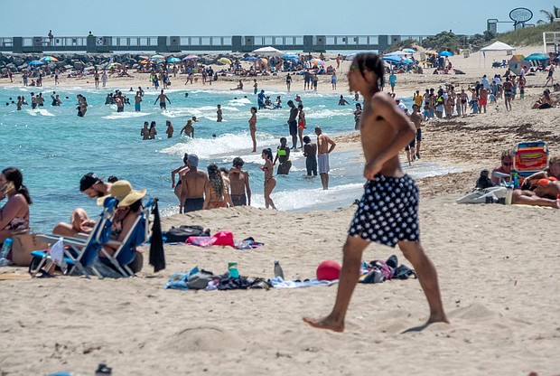 Biden administration officials are increasingly urging governors and local officials to reinstate or avoid relaxing public health restrictions as coronavirus cases continue to rise. People are shown spending spring break at the beach in Miami Beach, Florida, during the ongoing coronavirus pandemic.
Mandatory Credit: Cristobal Herrera-Ulashkevich/EPA-EFE/Shutterstsock
