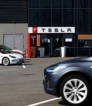 On April 2, Tesla revealed it did not build any of its two most expensive models, the Model S sedan and Model X SUV, in the first quarter. But it achieved a record number of deliveries of the less expensive Model 3 sedan and Model Y SUV in the same period.
Mandatory Credit:	Dean Mouhtaropoulos/Getty Images