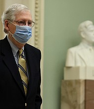 Senate Minority Leader Mitch McConnell, seen here in February, warned big businesses they would face "serious consequences" after accusing them of employing "economic blackmail" in attempts to influence voting laws as the backlash over Georgia's elections law that imposes voting restrictions intensifies.
Mandatory Credit:	Chip Somodevilla/Getty Images