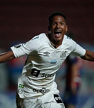 Angelo Gabriel celebrates after scoring a goal against San Lorenzo. He became the youngest goalscorer in Copa Libertadores history on April 6.
Mandatory Credit:	NATACHA PISARENKO/AFP/AFP via Getty Images