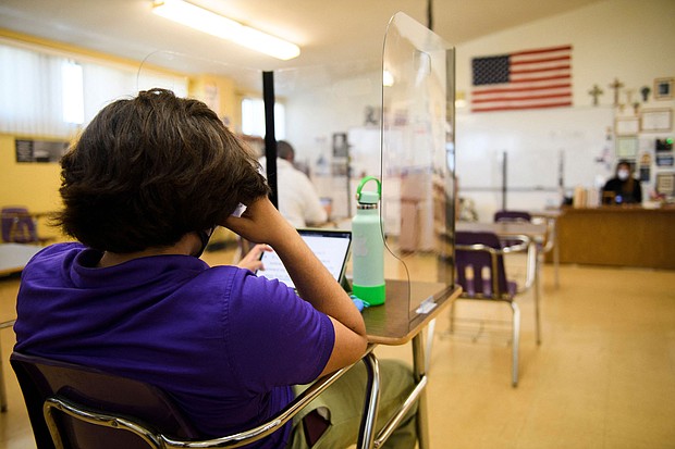 There has been a worrisome trend emerging in recent weeks: Covid cases among younger people are rising. A student is shown at St. Anthony Catholic High School in Long Beach, California, March 24.
Mandatory Credit:	Patrick T. Fallon/AFP/Getty Images