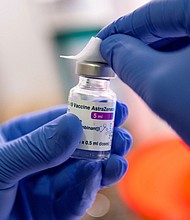 The safety committee of the European Medicines Agency (EMA) has found that the Oxford-AstraZeneca Covid-19 vaccine can cause unusual blood clots with low blood platelets, but stresses the overall benefits of the vaccine in preventing coronavirus outweigh the risks of side effects.
Mandatory Credit:	Lennart Preiss/AFP/Getty Images