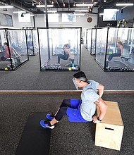 Infection risk while inside gyms is lower for fully vaccinated people, but unvaccinated people remain unprotected -- so both groups, if they go, should take the same precautions.
Mandatory Credit:	Frederic J. Brown/AFP/Getty Images