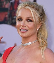 Britney Spears posted video on April 12 on her verified Instagram account she said was shot last year for the "Just a Touch of Rose" project. She is seen here in 2019.
Mandatory Credit:	VALERIE MACON/AFP via Getty Images