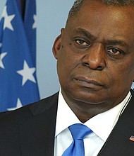 U.S. Defense Secretary Lloyd Austin listens to a reporter's question while addressing the media with German Defense Minister Annegret Kramp-Karrenbauer following talks at the Defense Ministry on April 13 in Berlin, Germany. Austin announced that the United States will deploy an additional 500 military personnel to Germany.
Mandatory Credit:	Sean Gallup/Getty Images