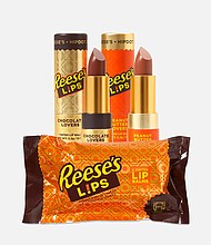 Reese's is teaming up with makeup company HipDot for a limited-edition collection that includes a eye shadow palettes in "milk chocolate" and "white chocolate" with six shades in each, as well as two lip balms and two makeup brushes.
Mandatory Credit:	Courtesy HipDot