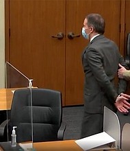 Chauvin was handcuffed in the courtroom and taken into custody by the Hennepin County Sheriff's Office.
Mandatory Credit:	POOL