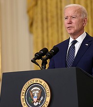 President Joe Biden called George Floyd's brother Philonise Floyd on April 19 as his family and the nation await a verdict in the trial of former Minneapolis police Officer Derek Chauvin.
Mandatory Credit:	Chip Somodevilla/Getty Images