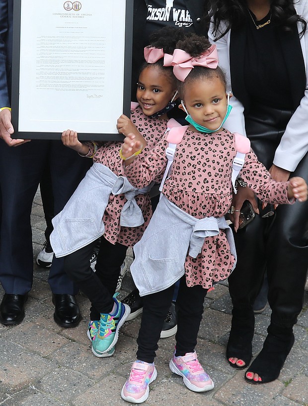 Who are these girls?-Eva Carter, 5, left, and her 3-year-old sister, Gabby Carter, are in Downtown by the Greater Richmond Convention Center.  Mayor Levar M. Stoney declared April 17 Giles B. Jackson Day and a proclamation was presented to Mr. Jackson’s descendants Saturday by state Delegates Jeff M. Bourne of Richmond and Lamont Bagby of Henrico, members of the Virginia Legislative Black Caucus at the kickoff of The JXN Project’s celebration commemorating the 150th anniversary of Jackson Ward.