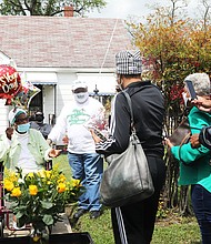 Marjorie Wilson Saunders, who touched the lives of hundreds of students during her teaching career at Richmond’s Maggie L. Walker and George Wythe high schools, is serenaded with “Happy Birthday” by family, including her daughter, Marjory, friends and former students who helped celebrate her 101st birthday on April 15.