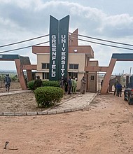 Two students who were kidnapped from a university in northern Nigeria last Tuesday have been killed, making it a total of five Greenfield University students killed by their abductors. A general view of the gate of the Greenfield University in Kaduna, Nigeria, is shown on April 21, 2021.
Mandatory Credit: Nasu Bori/AFP/Getty Images