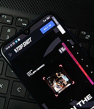 NBA Top Shot allows users to procure a collection of digital basketball highlights.
Mandatory Credit:	Rokas Tenys/Alamy Stock Photo