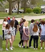 People gather for a prayer vigil in Arcadia, IN, in memory of two tenagers kllled in a car crash on their way to their prom.
Mandatory Credit:	WISH	People gather for a prayer vigil in Arcadia, IN, in memory of two tenagers kllled in a car crash on their way to their prom.
Mandatory Credit:	WISH