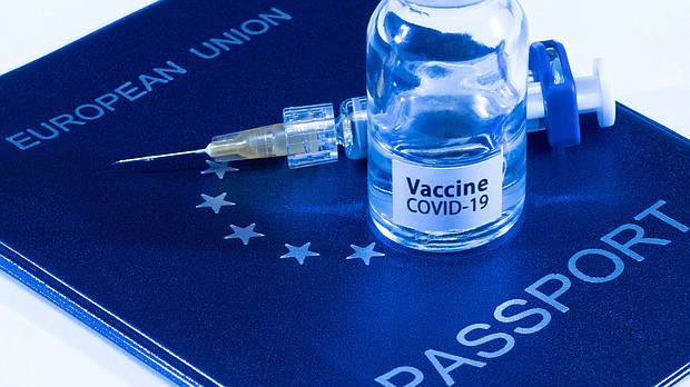 "Vaccine passports" could pave the way for relaxed restrictions on external EU borders.
Mandatory Credit: JOEL SAGET/AFP/AFP via Getty Images