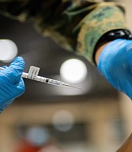 Pfizer expects to file for full US Food and Drug Administration approval for its Covid-19 vaccine for people ages 16 to 85 this month.
Mandatory Credit:	Mark Makela/Getty Images