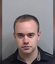 Garrett Rolfe, the former Atlanta police officer who fatally shot Rayshard Brooks in a Wendy's parking lot, was wrongly terminated, the Atlanta Civil Service Board has ruled.
Mandatory Credit:	Fulton County Sheriff's Department