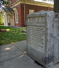 This stone marker outside the Manchester Courthouse at 10th and Hull streets was put in place 86 years ago to honor the Manchester Elliott Grays, a Confederate unit formed just days after Virginia became an official Confederate state in 1861. It stands in the shadow of the courthouse now named for noted civil rights attorney and Richmond’s first Black mayor, Henry L. Marsh III, and his late brother, attorney Harold M. Marsh Sr.