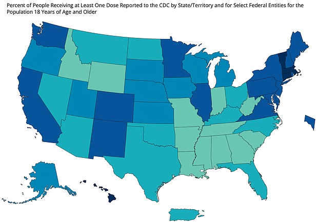 States in darker blue have a higher percentage of adults that has received at least one Covid-19 vaccine dose, according to CDC data.
Mandatory Credit:	CDC