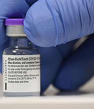 A 23-year-old woman who was mistakenly given six doses of the Pfizer BioNTech Covid-19 vaccine has been discharged from the hospital where she was being monitored for any adverse reaction.
Mandatory Credit:	Justin Tallis/Pool/Getty Images