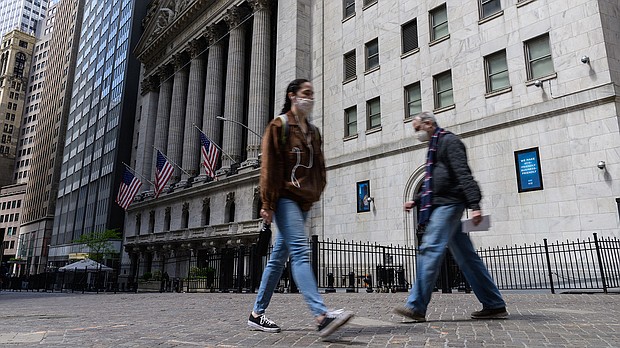 US stocks tumbled out of the gate Tuesday as investors grow increasingly concerned about raw material price spikes, shortages and inflation.
Mandatory Credit:	Angela Weiss/AFP/Getty Images