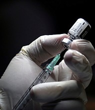 The Biden administration is open to sharing coronavirus vaccines and other humanitarian assistance to help North Korea combat the deadly pandemic, according to two sources familiar with internal discussions.
Mandatory Credit:	Carlos Osorio/Pool/AFP/Getty Images