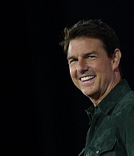 Tom Cruise has returned his Golden Globe Awards amid controversy surrounding the organization behind the event.
Mandatory Credit:	Chris Delmas/AFP/Getty Images