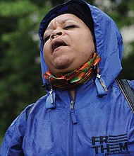 Drea d’Nur sings a song of freedom as The FreeTHEM Walk reaches Lumpkin’s Jail site, known as the “Devil’s Half-Acre,” in Richmond’s Shockoe Bottom.