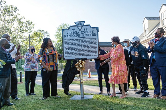 Public historian and researcher Elvatrice Belsches, left, and Dr. Sylvia D. Statton unveil the newly redone historical marker about educator ...