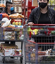 Calling it "an exciting and powerful moment," the director of the US Centers for Disease Control and Prevention is to announce May 13 that people fully vaccinated against Covid-19 do not need to wear masks or practice social distancing indoors or outdoors, except under certain circumstances.
Mandatory Credit:	David Paul Morris/Bloomberg/Getty Images