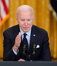 President Joe Biden's steadfast belief in taxing corporations and the rich has become a central plank in his legislative agenda, even as he's warned of political peril and red lines from Republicans.
Mandatory Credit:	Patrick Semansky/AP