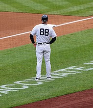 Seven members of the New York Yankees' coaching and support staff have tested positive for Covid-19 despite being inoculated with the Johnson & Johnson vaccine, the baseball team's manager said. On May 11, the Yankees said third base coach Phil Nevin had tested positive.
Mandatory Credit:	Rich Schultz/Getty Images