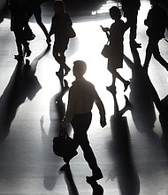 Working long hours is killing hundreds of thousands of people a year through stroke and heart disease, according to the World Health Organization (WHO).
Mandatory Credit:	Timothy A. Clary/AFP/Getty Images