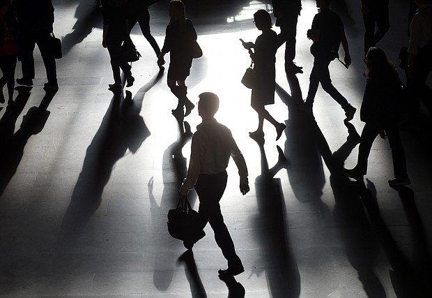 Working long hours is killing hundreds of thousands of people a year through stroke and heart disease, according to the World Health Organization (WHO).
Mandatory Credit: Timothy A. Clary/AFP/Getty Images