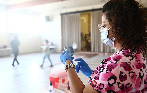 The president of the country's largest nurses' union has spoken out against updated federal guidance which says that -- with a few exceptions -- people who are fully vaccinated against Covid-19 don't need to wear face masks in indoor or outdoor settings.
Mandatory Credit: Mario Tama/Getty Images