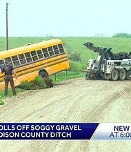 Ten elementary students and a bus driver were involved in a rollover crash Monday in Madison County.
Mandatory Credit:	KCCI