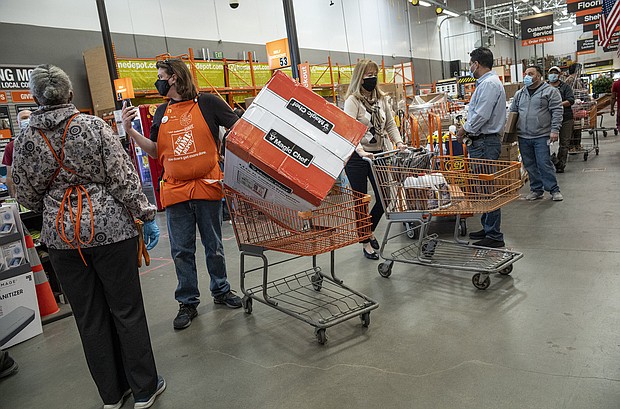 Home Depot reported sales and earnings for the first quarter May 18 that topped forecasts. The rising price of lumber and other inflation pressures have helped Home Depot, whose stock has surged 20% so far this year.
Mandatory Credit:	David Paul Morris/Bloomberg/Getty Images