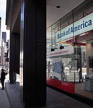 Bank of America said May 18 that it will raise the hourly minimum wage of its US employees to $25 by 2025.
Mandatory Credit:	Scott Olson/Getty Images