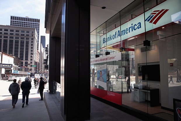 Bank of America said May 18 that it will raise the hourly minimum wage of its US employees to $25 by 2025.
Mandatory Credit:	Scott Olson/Getty Images