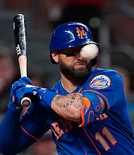 Mets' Kevin Pillar is hit in the face with a pitch from Braves pitcher Jacob Webb in the seventh inning on May 17 in Atlanta.
Mandatory Credit:	John Bazemore/AP